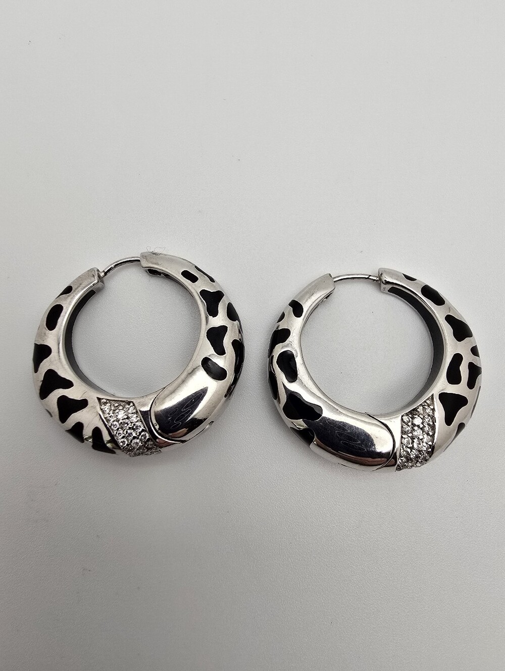 Crystal-Accented Silver Hoop Earrings with Black Animal Print